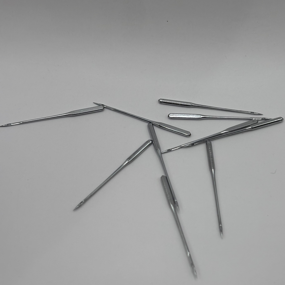image of universal size needles for sewing